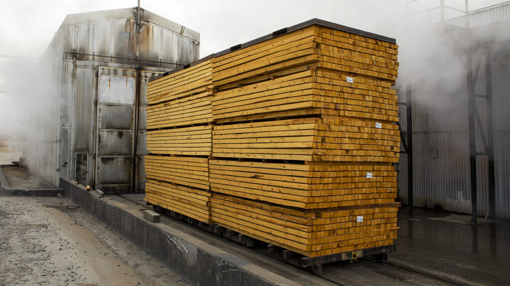 Stack of Lumber next to kiln